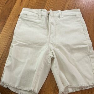 White free people shorts light weight with fringe bottom.  Size 00